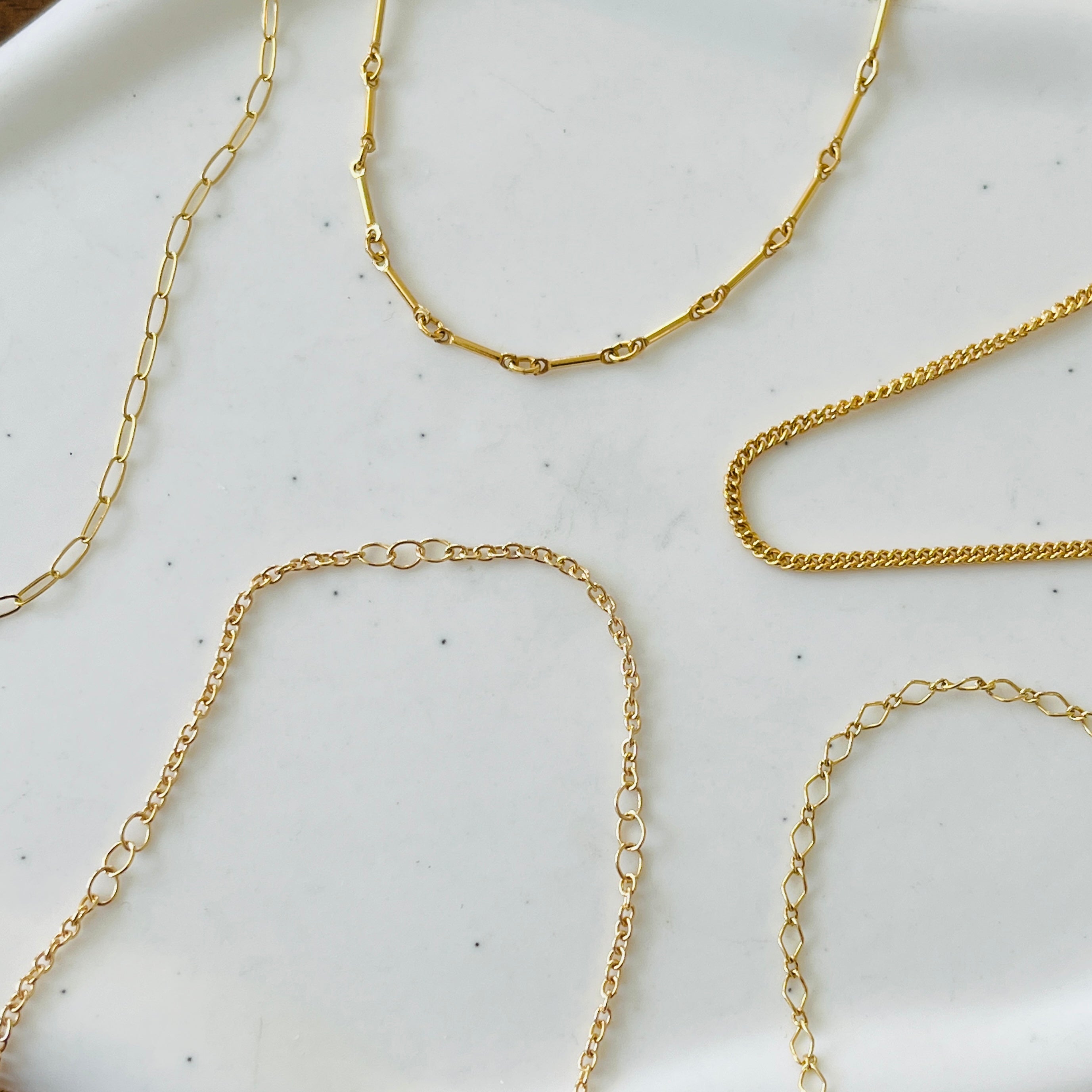 LAYERING NECKLACES