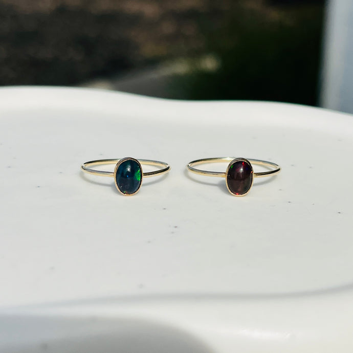 a couple of rings sitting on top of a white table
