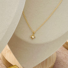 Load image into Gallery viewer, a gold necklace with a star on it
